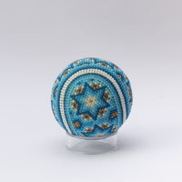 Pelota de tenis huichol